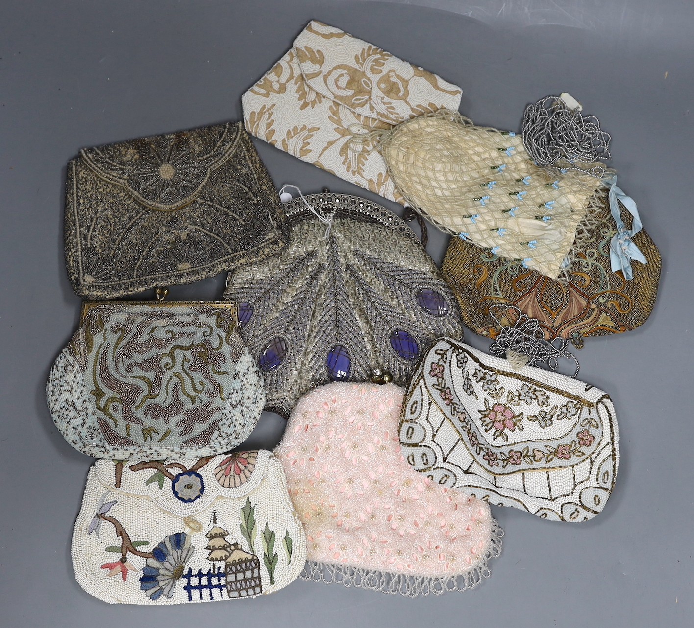 Nine mixed late 19th century to mid 20th century multicoloured bead worked and embroidered evening bags